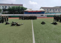 泰州市教育局、高港区人武部领导莅临江苏省口岸中学指导军训工作